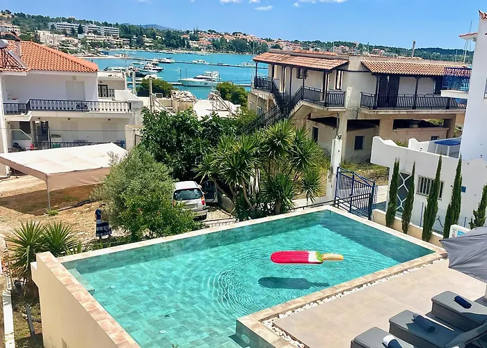 Nyaraló Portoheli Downtown, Pool & Port View